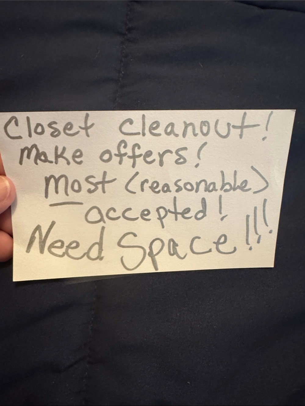 Handwritten Closet Cleanout Note on Dark Navy Fabric